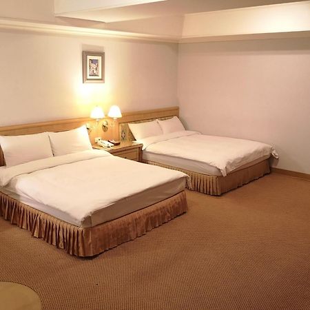 Kingdom Hotel Sin-ču Pokoj fotografie